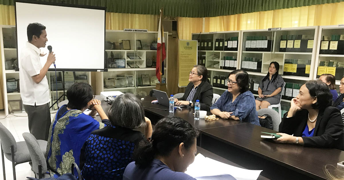ENSURING EXCELLENCE. VSU President Edgardo E. Tulin speaks with auditors from TUV Rheinland during VSU's first stage audit for ISO 9001:2015. ENSURING EXCELLENCE. VSU President Edgardo E. Tulin speaks with auditors from TUV Rheinland during VSU's first stage audit for ISO 9001:2015.
