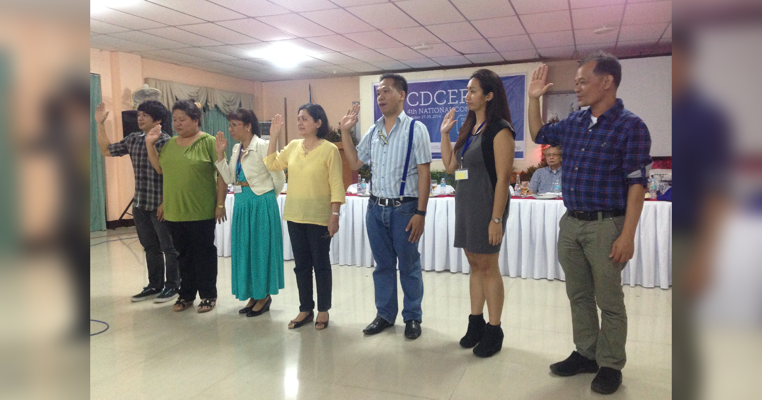 NEW OFFICERS. The new set of officers of the Consortium of Dev’t Comm. Educators & Practitioners in the Philippines take their oath. DDC’s Dr. Rotacio Gravoso (rightmost) and Dr. Christina Gabrillo (second from left) are elected president and secretary, respectively. Photo by Jed Cortes.