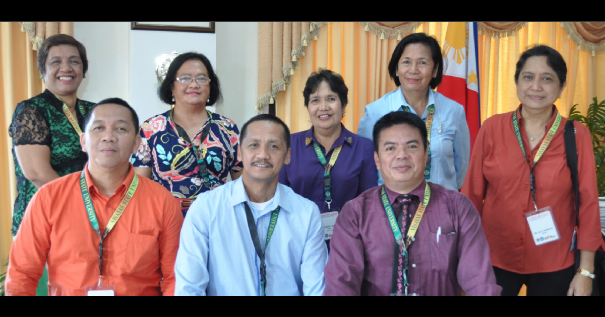 The AACCUP accreditors during the courtesy call at the VSU Office of the President: (L-R, sitting) Prof. Alberto M. Cabrera, Dr. Henry A. Mabesa, Jr., and Dr. Charlito P. Cadag; (L-R, standing) Prof. Aida L. Dela Cerna, Dr. Divinagracia M. De Guzman, Dr. Celeste V. Francia, Dr. Lydia P. Libunao, and Dr. Luz P. Napoles.